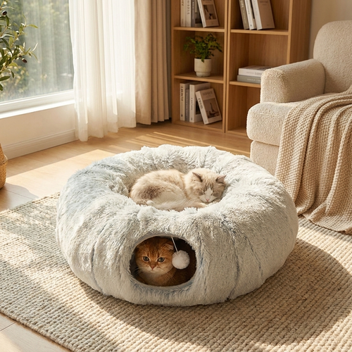 Plush cat bed with tunnel in use